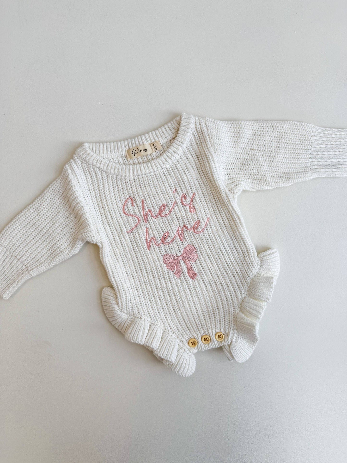 Petite + Co - She's Here Bow - Frill Leg Romper - Milk