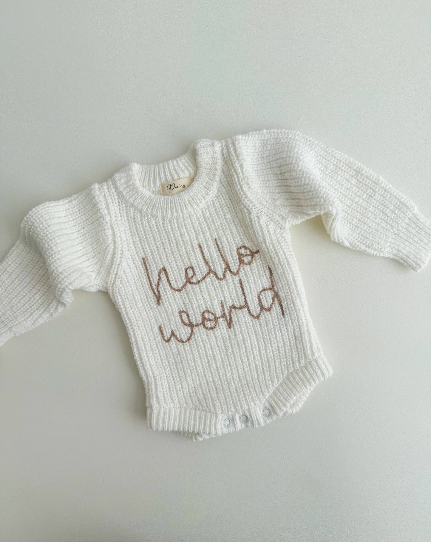 Petite + Co - HELLO WORLD TEXTURED SNOW ROMPER