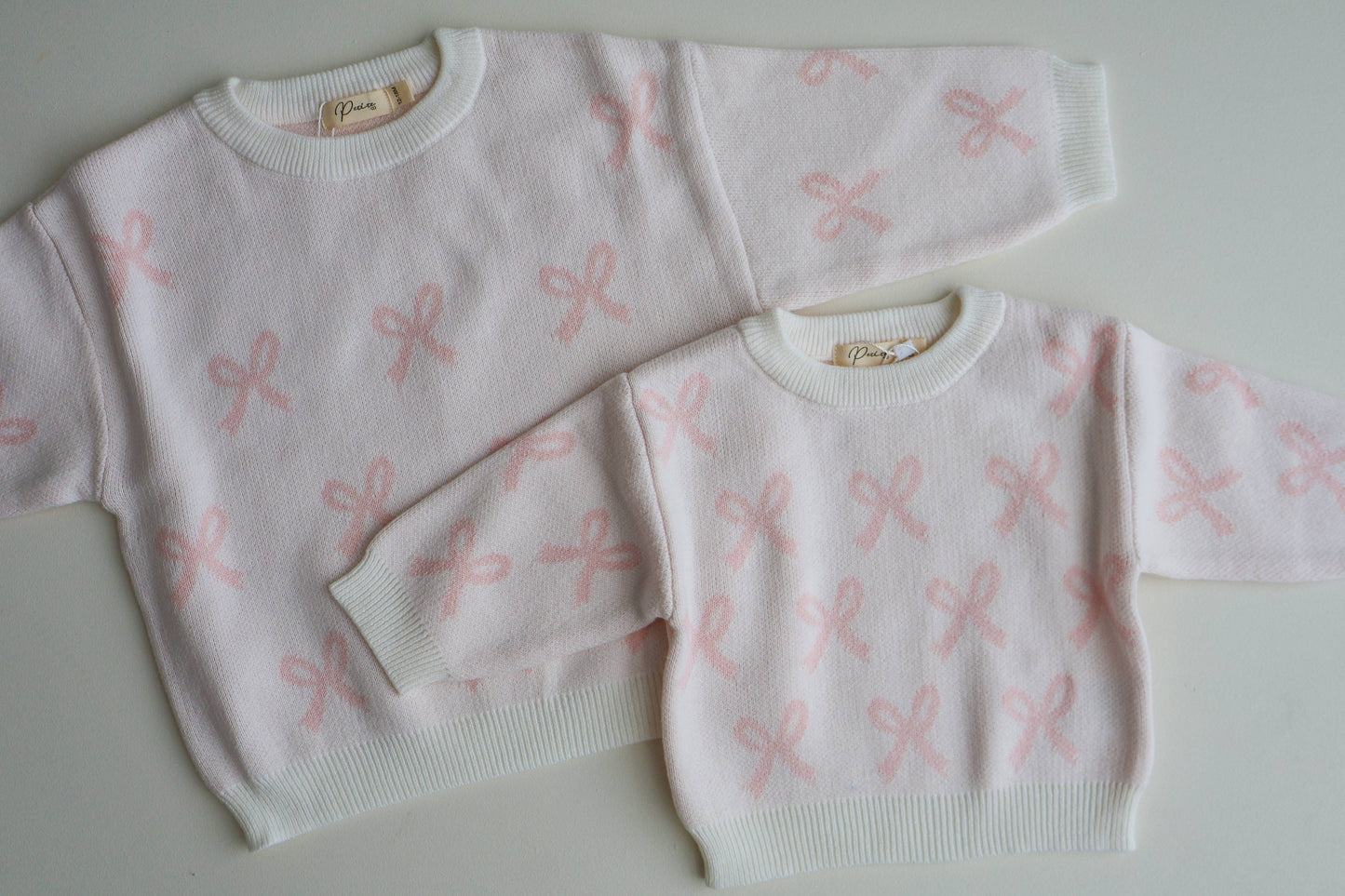Petite + Co - BOW JUMPER | MILK + BABY PINK BOWS