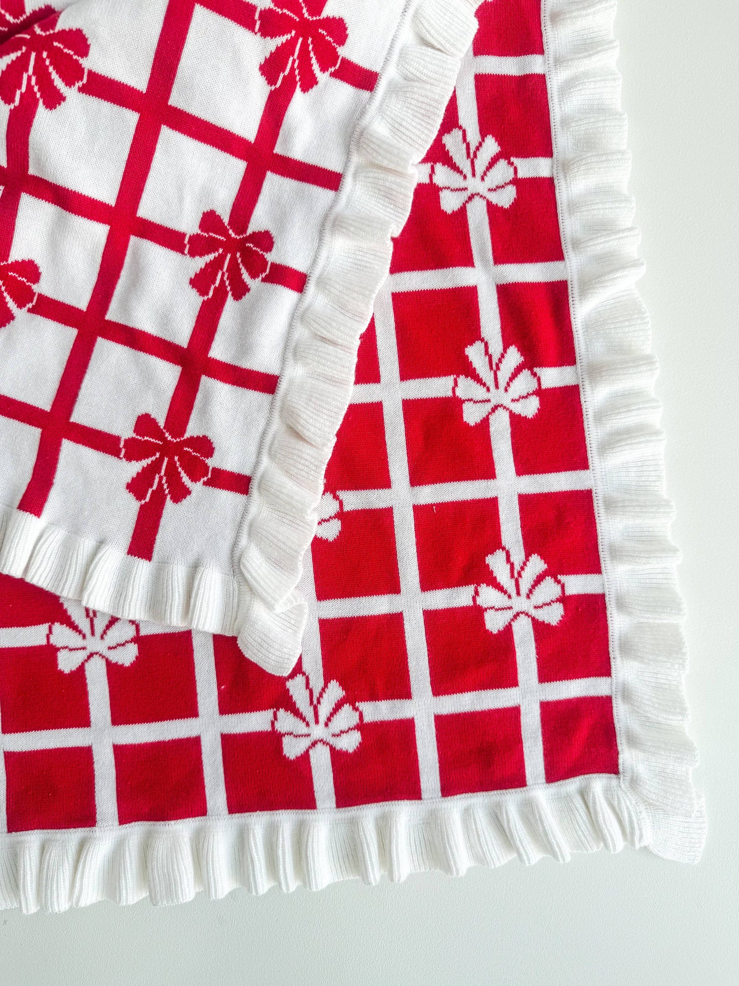 Petite + Co - FRILL CHECK BOW BLANKET| RED + MILK | REVERSIBLE