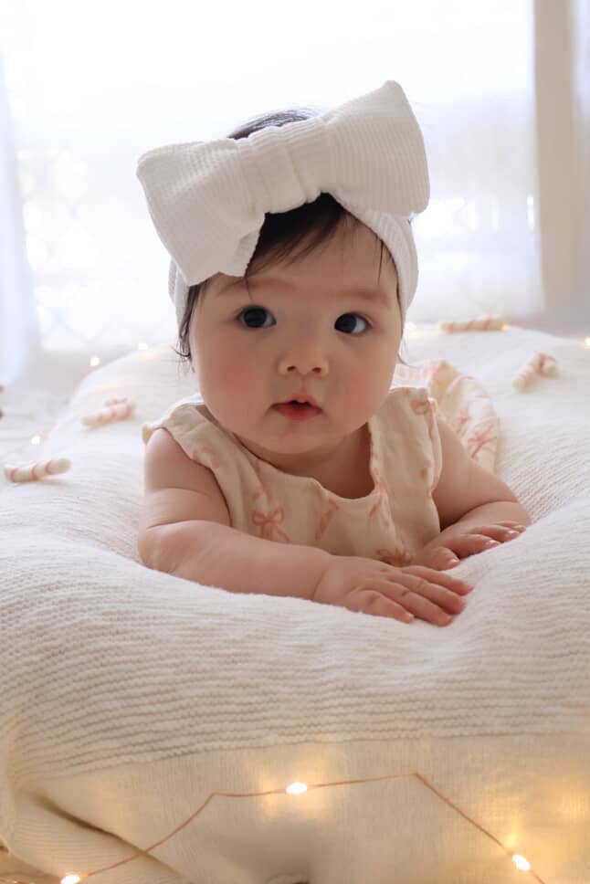 Petite + Co - MUSLIN BOW CANDY CANE ROMPER